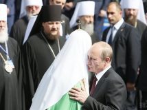 Putin: Russia is ready to defend believers in Ukraine